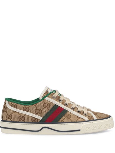 tenis gucci dorados|farfetch tennis Gucci.